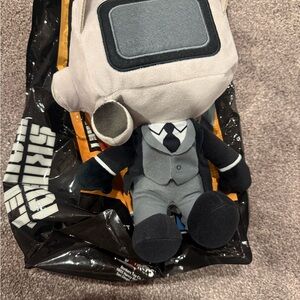 Gray and Black Stuffed Animal Toy